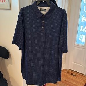 Men’s Ben Hogan golf shirt Xl like new condition. No snags or stains. Navy blue.